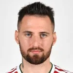 T. Kádár